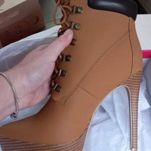 Heel boots brand new with original box